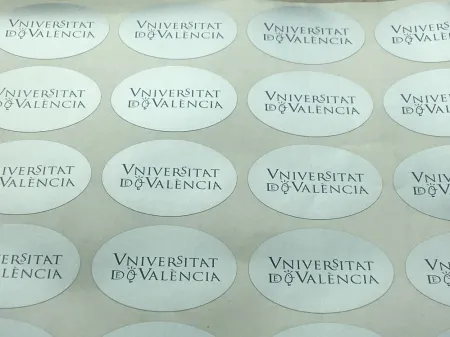 Pegatinas (25 Ud) Universitat de València Ovalada Plateada 5,8 X 4,4 cm (Pack 25 Uds)
